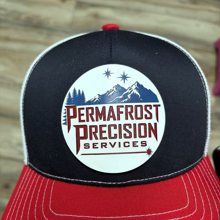 Permafrost Precision shop hat with the round mountain logo patch
